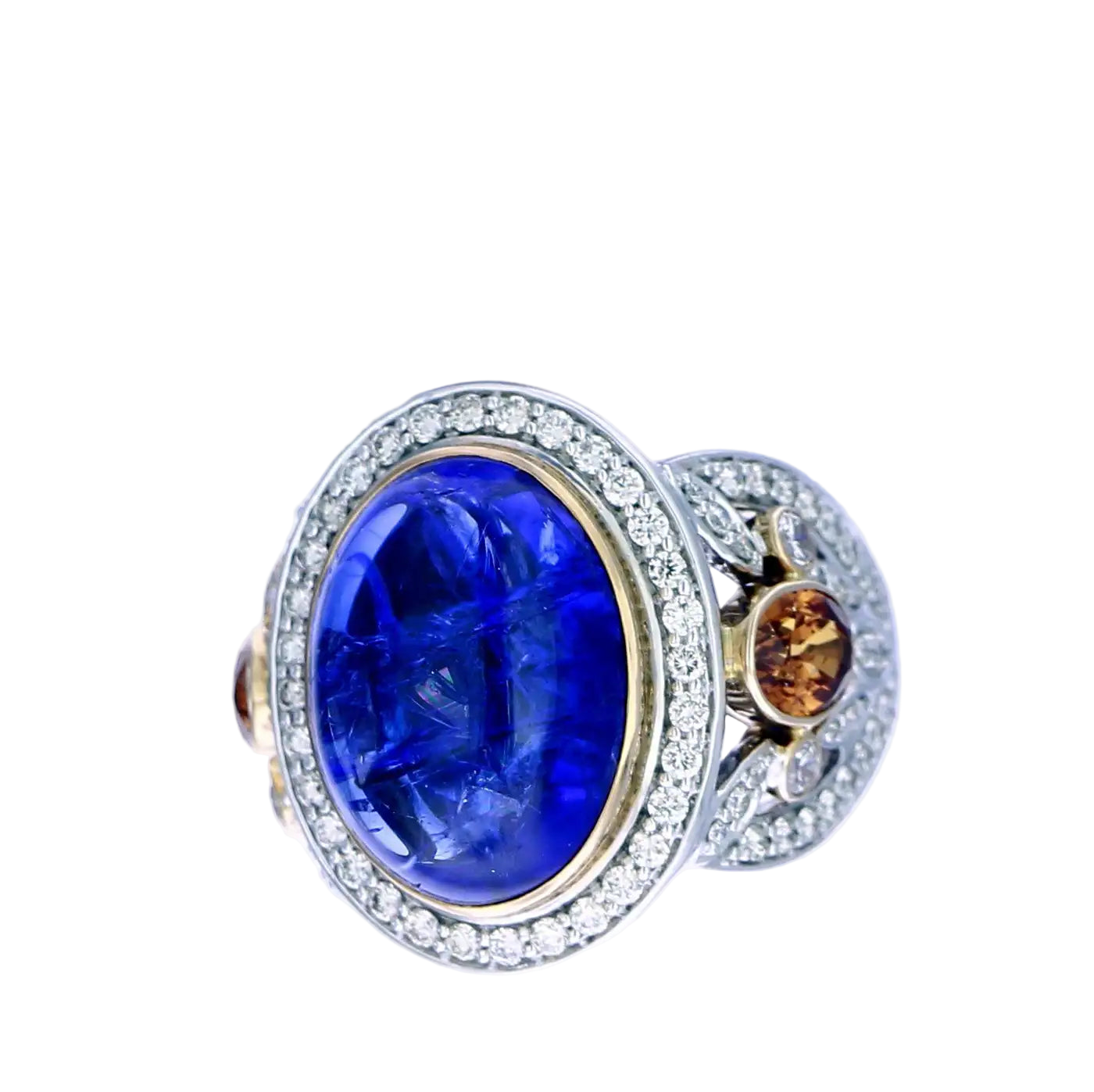 Antique Bluebird 15 Carat Tanzanite, Diamond and Spessartite Garnet Ring